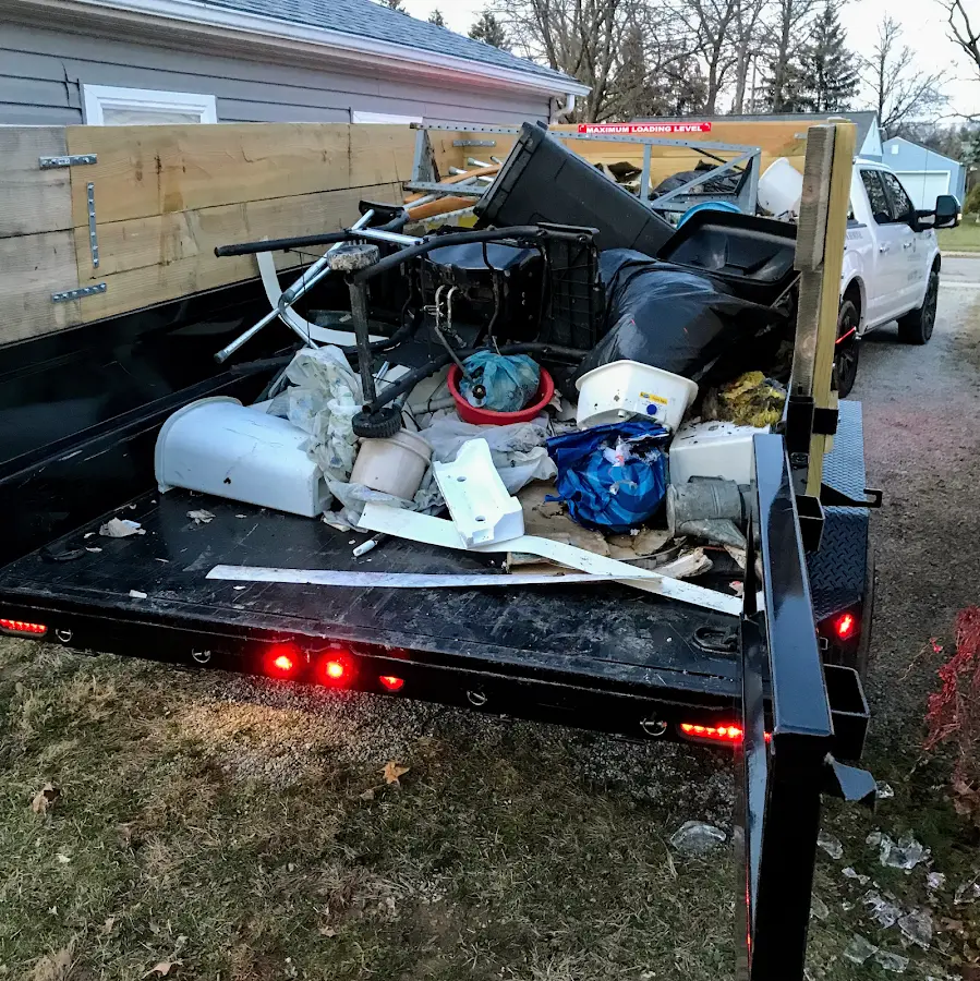 Roll-off dumpster delivered to a residential driveway in Winterville