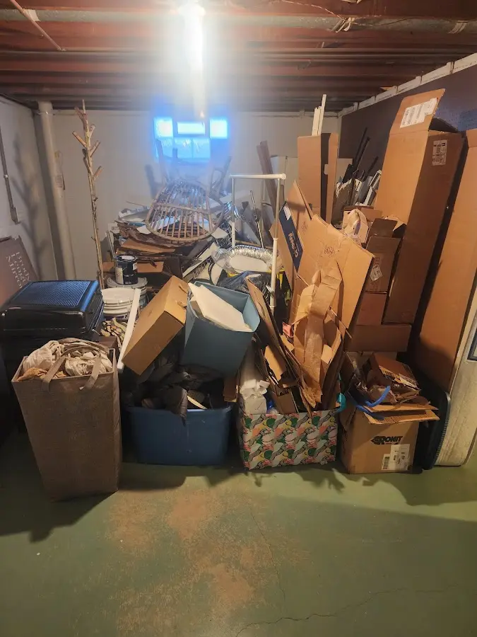 Roll-off dumpster container at job site for 2 Yard Dumpster Rental in Winterville